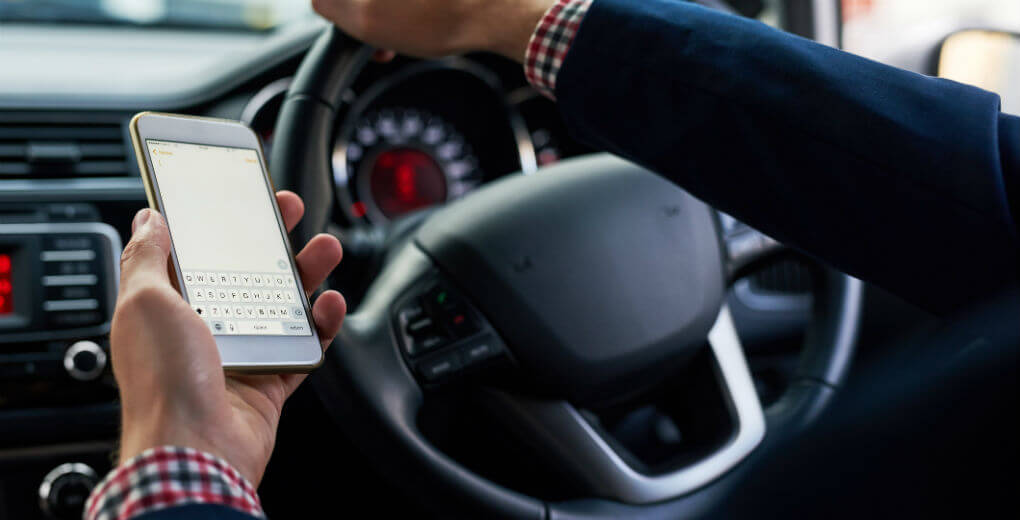 Checking mobile phone in vehicle