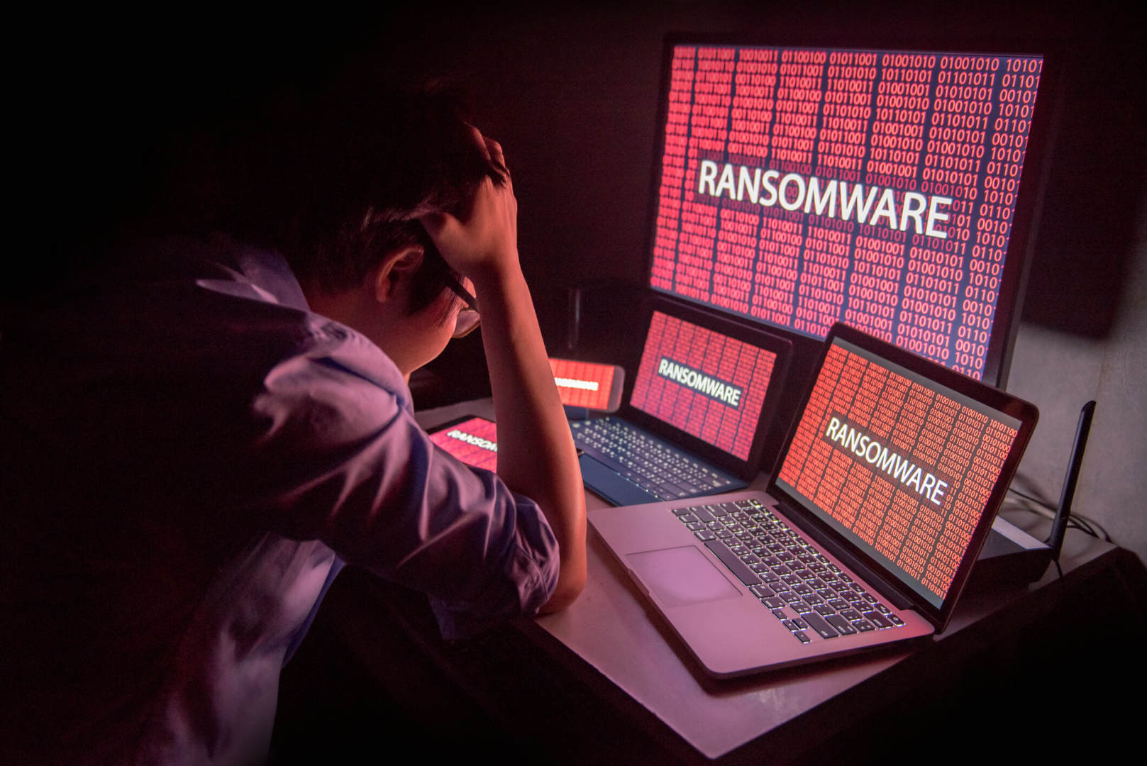 Male frustrated by ransomware cyber attack